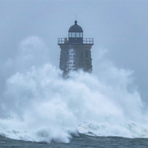 Whaleback Lighthouse in storm seas. Photo by Dominic Trapani