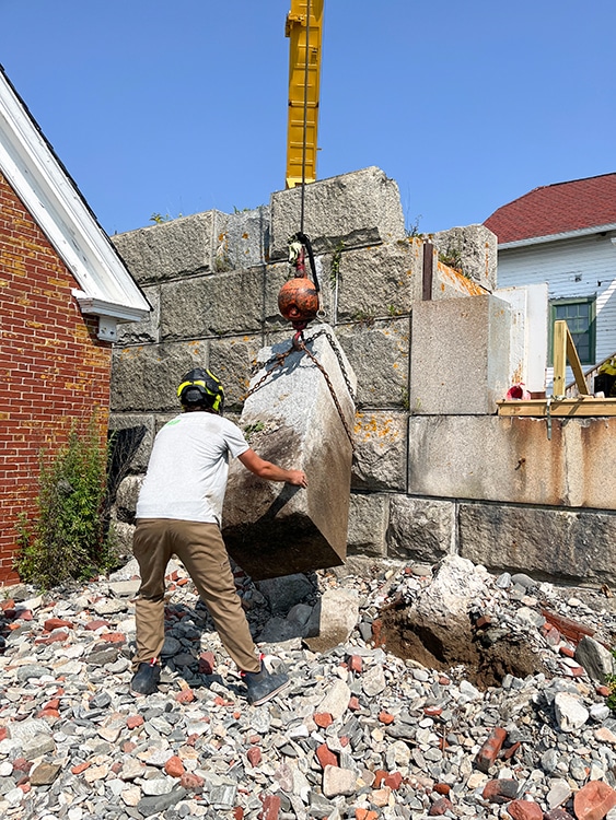 Boucher working near the oil house